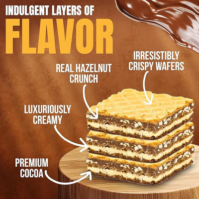 Layered dessert with hazelnut crunch, crispy wafers, and creamy filling on a wooden board.