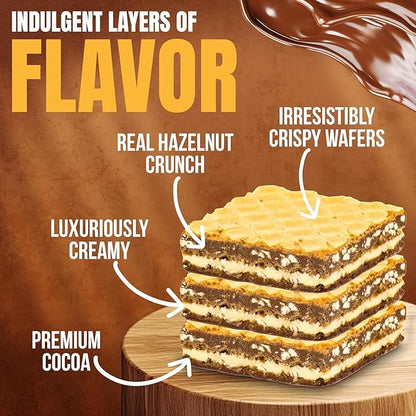 Layered dessert with hazelnut crunch, crispy wafers, and creamy filling on a wooden board.