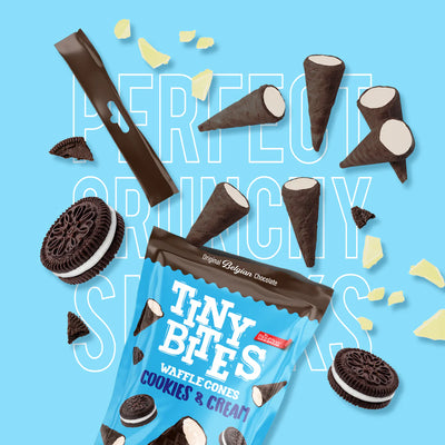 Packaging of Tiny Bites waffle cones with cookies and cream flavor on a blue background.
