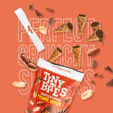 Packaging of Tiny Bites Waffle Cones Peanut Butter with waffle cones and peanuts on an orange background.