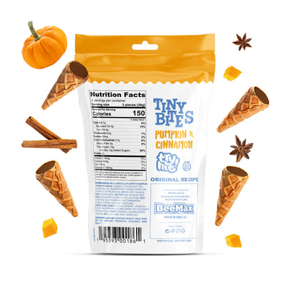 Packaging of Tiny Bites Pumpkin & Cinnamon flavored treats with waffle cones and spices on a white background.