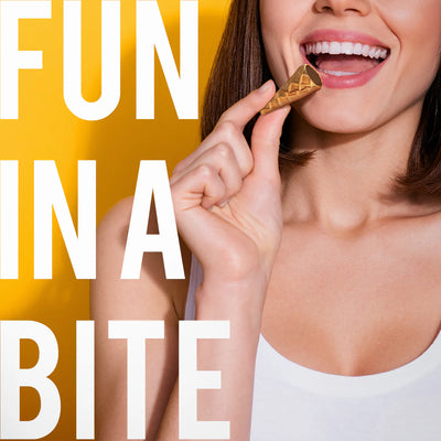 Woman eating a chocolate bar with 'FUN IN A BITE' text on a yellow background