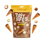 Packaging of Tiny Bites Waffle Cones Hazelnut with product around on a white background