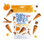 Packaging of Tiny Bites Waffle Cones with pumpkins, cinnamon sticks, and star anise on a white background